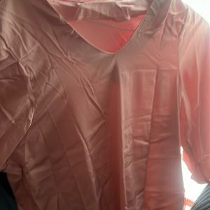 A beautiful pink polyester shirt
